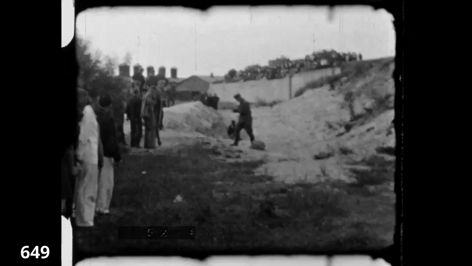 Screenshot from the Wiener Film mass execution in Liepaja 1942 fc 0649 - POV from Lorry away towards execution pit